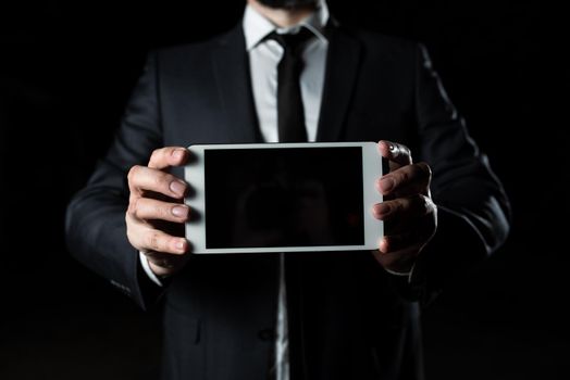 Businessman Presenting Important Informations On Phone Screen.