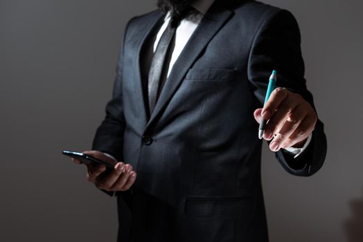 Man Holding Tablet And Pointing With Pen On Important Message.