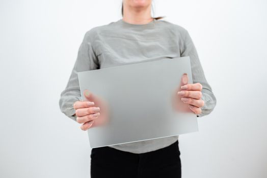 Businesswoman Holding Blank Placard And Advertising The Business.