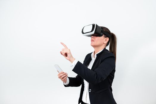 Woman Holding Mobile Phone, Wearing Vr Glasses And Pointing On New Idea.