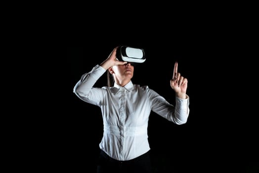 Businesswoman Wearing Headset And Enjoying Virtual Reality Simulator.