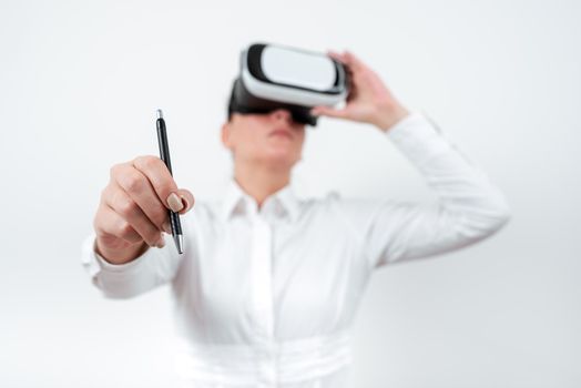 Woman Wearing Vr Glasses And Pointing On Recent Updates With Pen.