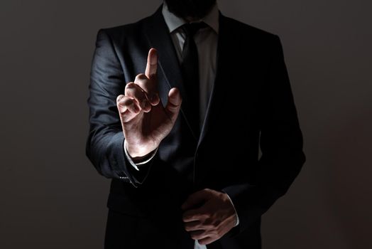 Businessman In Suit Pointing With One Finger On Important Message.