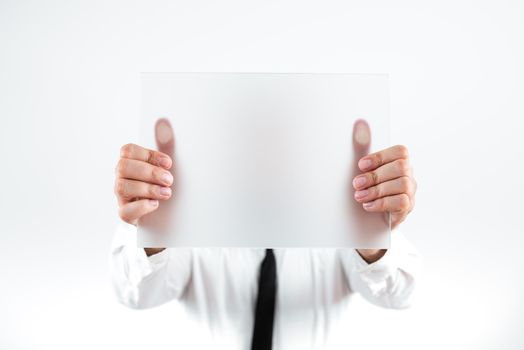 Man Holding Placard Presenting Important Strategies For Progress.