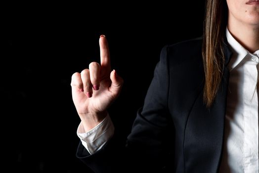 Businesswoman Pointing Important Infortmations With One Finger.