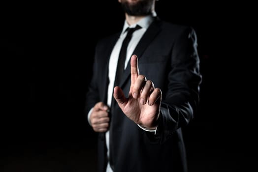 Businessman Pointing Important Infortmations With One Finger.