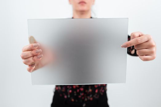 Woman Pointing At Placard And Presenting New Ideas For Marketing.