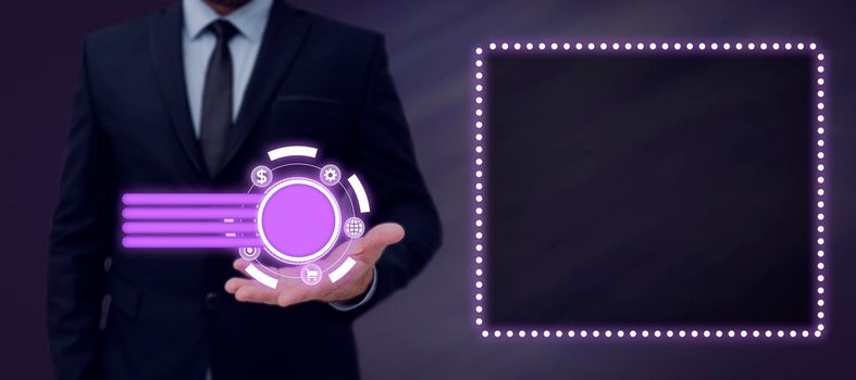 Man In Suit Presenting With Hand Digital Symbols For Business.