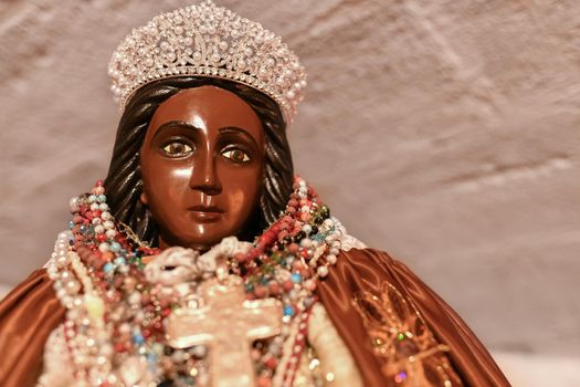 Black Saint Sarah in a church, the patroness of the gypsies