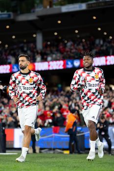 MELBOURNE, AUSTRALIA - JULY 19: Bruno Fernandes and Fred of Manchester United playing against Crystal Palace in a pre-season friendly football match at the MCG on 19th July 2022