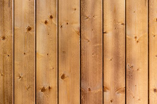 Surface made of vertically laid wooden, light planks Texture, background for further work.