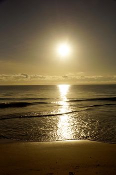 Early Morning Sunrise on Waimanalo Beach on Oahu, Hawaii over the clouds. 2016.