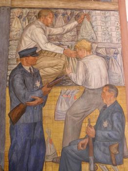 People and Guards move money in Coit Tower Mural. Public Works Art Project (PWAP, part of the New Deal during the Great Depression) murals, now protected as a historical treasure, can be viewed daily inside the first floor of Coit Tower.
