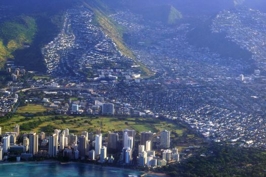 Aerial view of Waikiki Beach, hotels, Ala Wai Canal, Kapahulu town, Pacific ocean, Kahala and Golf Course on Oahu, Hawaii.