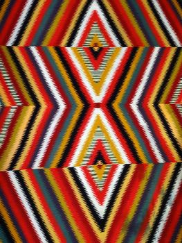 Pattern Red, Orange, White, Green, Black, and blue Diamond Blanket/ Rug - Navajo Artist, made about 1885 of cotton and wool.                              