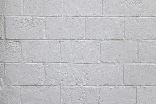 The old white concrete tile wall background and texture