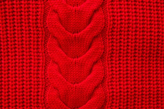Red knitted winter sweater Background texture