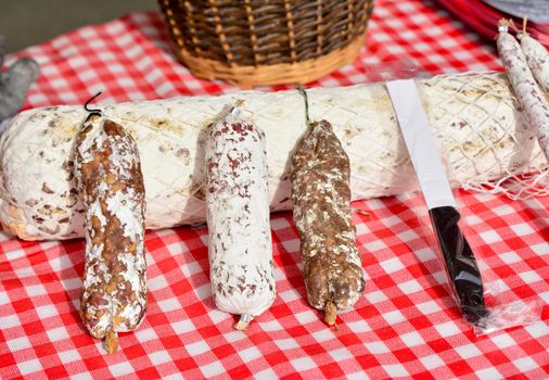 Dried sausage in white packaging in the French market
