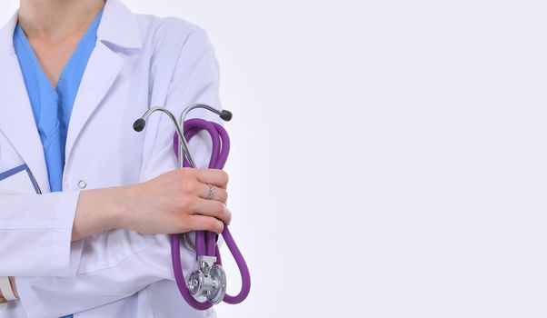 Portrait of female doctor standing against isolated on white background. Woman doctor