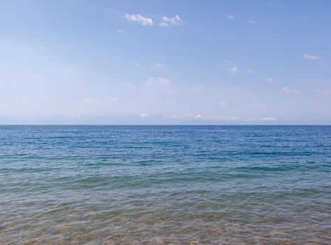 Seascape of clear water on the sea. Clear water on the ocean, sea or lake. Water ripples in the sun.