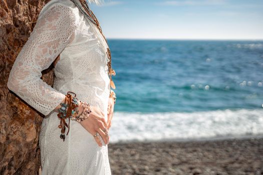 fashionable young model in boho style dress