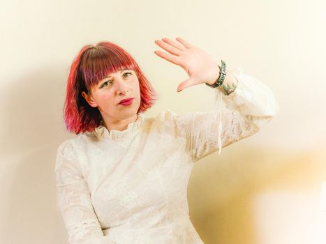 expressive young red haired woman studio shots