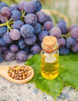 grape seed oil in a small jar. Selective focus.nature