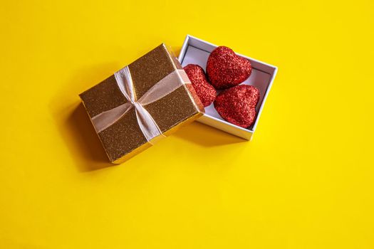 Gift box on a wooden background. Valentine's Day gift.selectiv focus.holiday