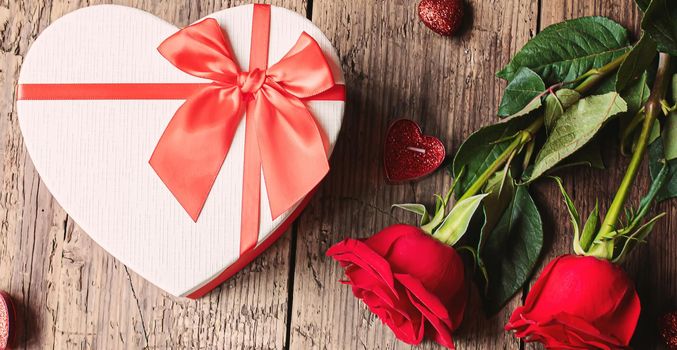 Gift box on a wooden background. Valentine's Day gift.selectiv focus.holiday