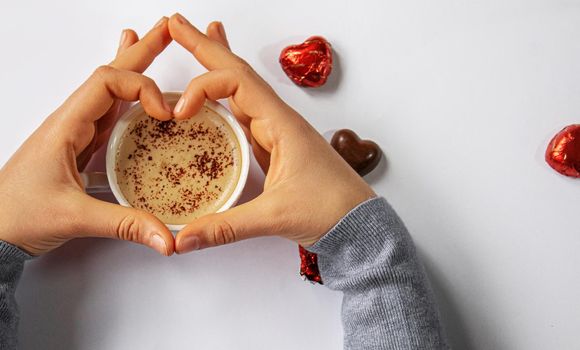 Cup drink for Breakfast in the hands of lovers. Selective focus.people