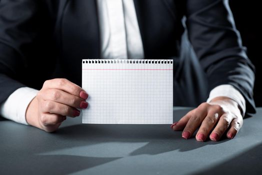 Businesswoman Holding Note With Important Message With One Hand.