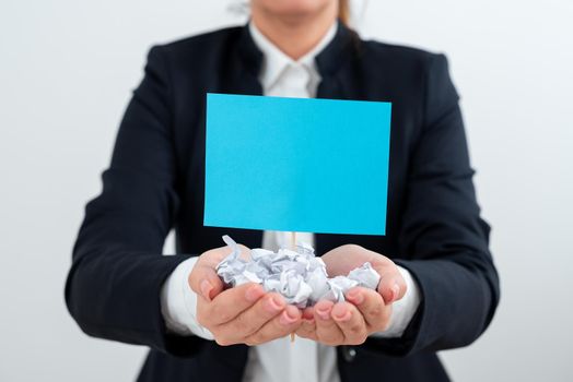 Businesswoman Holding Paper Wraps And Important Message On Stick.