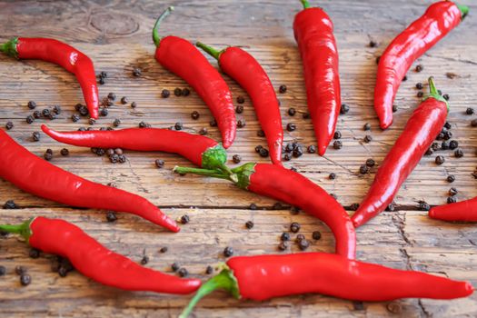 hot chili peppers on wooden background. selective focus.nature