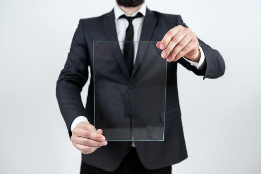 Businessman Holding Transparent Glass And Promoting The Company Brand.