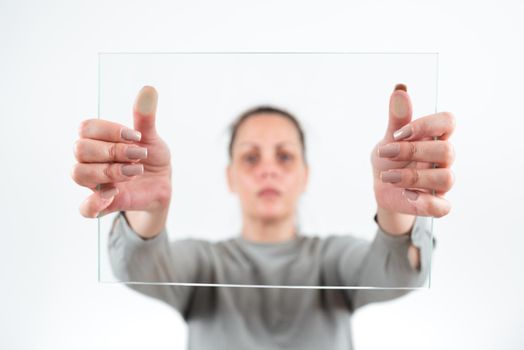 Businesswoman Holding Glass Banner And Promoting The Business.