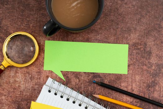 Speech Bubble With Spiral Book And Coffee Showing New Ideas For Business.