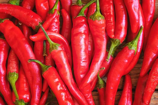 hot chili peppers on wooden background. selective focus.nature