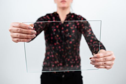 Businesswoman Holding Glass Banner And Advertising The Company.