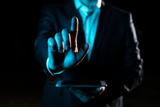 Businessman Pointing Important Infortmations With One Finger.