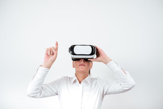 Woman Wearing Vr Glasses And Pointing On Important Message With One Finger.