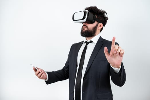 Man Wearing Vr Glasses And Pointing On Important Messages With One Finger.