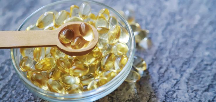 vitamin E capsules. selective focus medical