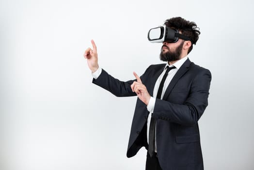 Man Wearing Vr Glasses And Pointing On Important Messages With Both Hands.