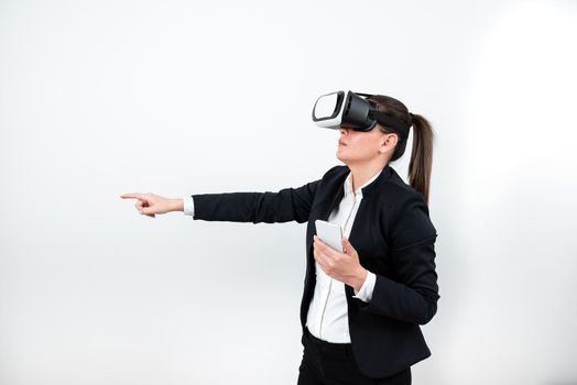 Woman Holding Mobile Phone, Wearing Vr Glasses And Pointing On New Idea.