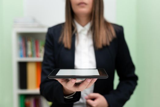 Businesswoman Holding Tablet And Presenting Important Message.