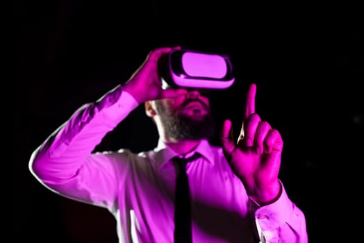 Businessman Wearing Headset And Enjoying Virtual Reality Simulator.