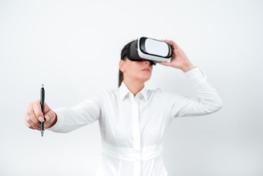 Woman Wearing Vr Glasses And Pointing On Recent Updates With Pen.