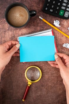 Hands Of Woman With Blank Paper, Coffee Cup And Stationery Over Wood.