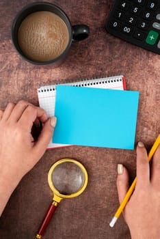 Hands Of Woman With Blank Paper, Coffee Cup And Stationery Over Wood.