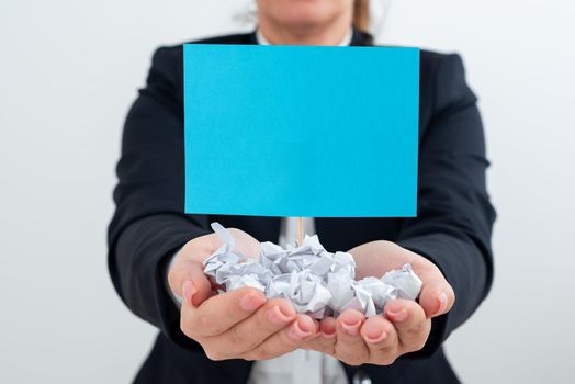 Businesswoman Holding Paper Wraps And Important Message On Stick.